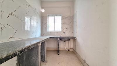 Kitchen Image of 1140 Sq.ft 3 BHK Apartment / Flat for sale in Kalikapur, EM Bypass Kolkata for Rs. 8700000