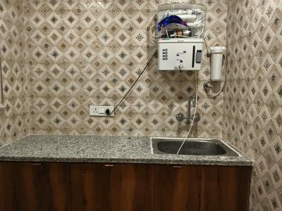 Kitchen Image of 900 Sq.ft 1 RK Apartment / Flat for rent in Sector 53 Gurgaon for Rs. 25000