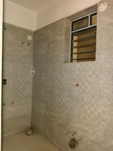 Common Bathroom Image of 551 Sq.ft 1 BHK Apartment / Flat for sale in Cosmos Meluha, Khidkali Thane for Rs. 4299999