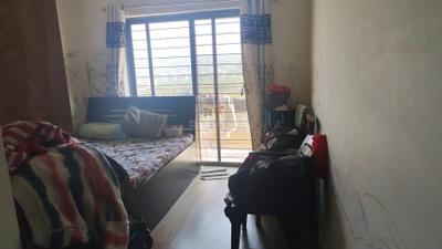 Bedroom Image of 1040 Sq.ft 2 BHK Apartment / Flat for sale in Skyi Songbirds , Bhugaon Pune for Rs. 7800000