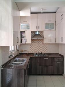 Kitchen Image of 875 Sq.ft 1 BHK Apartment / Flat for rent in Amrapali Princely Estate, Sector 76 Noida for Rs. 15000