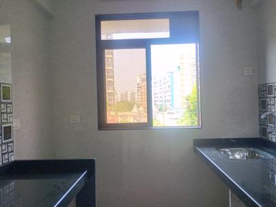 Kitchen Image of 711 Sq.ft 1 BHK Apartment / Flat for sale in Regency Anantam, Dombivli East Thane for Rs. 3940000