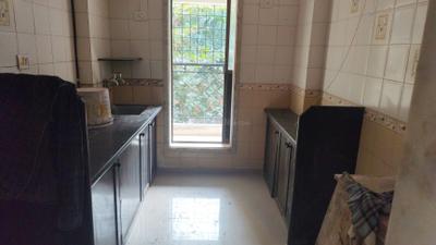 Kitchen Image of 900 Sq.ft 2 BHK Apartment / Flat for rent in Rashmi Drashtant, Mira Road East Mira Bhayandar for Rs. 28000
