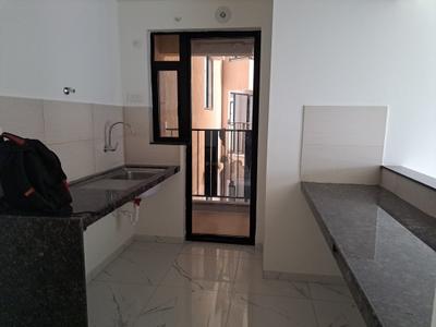 Kitchen Image of 950 Sq.ft 2 BHK Apartment / Flat for rent in Mahindra Nestalgia, Pimpri Pune for Rs. 35000