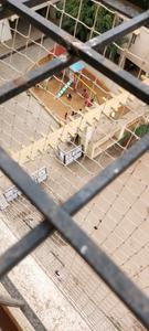 Balcony Image of 945 Sq.ft 2 BHK Apartment / Flat for sale in Siddartha Builders Srinilaya, Electronic City Bengaluru for Rs. 5000000