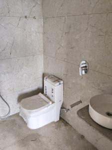 Common Bathroom One Image of 960 Sq.ft 2 BHK Apartment / Flat for sale in Kavisha Panorama, Bopal Ahmedabad for Rs. 6499999