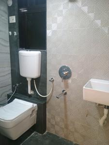Common Bathroom Image of 950 Sq.ft 2 BHK Apartment / Flat for sale in Titwala Thane for Rs. 3600000