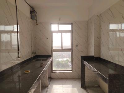 Kitchen Image of 700 Sq.ft 2 BHK Apartment / Flat for sale in Kandivali West Mumbai for Rs. 13800000