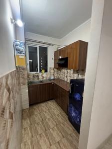 Kitchen Image of 945 Sq.ft 2.5 BHK Apartment / Flat for rent in NBCC Golf Homes, Noida Extension Greater Noida for Rs. 19000