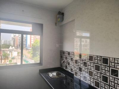 Kitchen Image of 700 Sq.ft 1 BHK Apartment / Flat for rent in Kavya Residency, Kasarvadavali Thane for Rs. 17001