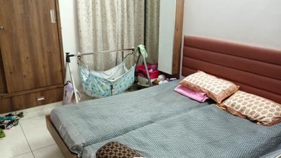 Bedroom Image of 650 Sq.ft 2 BHK Apartment / Flat for sale in Shreenath Suncity Heaven, Dharam Nagar Rajkot for Rs. 4551000