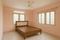 Srijani Apartment Bedroom 1
