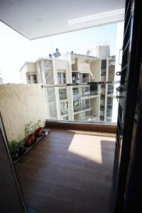 Balcony Image of 933 Sq.ft 2 BHK Apartment / Flat for sale in Kohinoor Courtyard One, Wakad Pune for Rs. 10600000