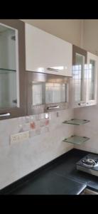 Kitchen Image of 943 Sq.ft 2 BHK Apartment / Flat for rent in Aum Sanskruti Casa Imperia, Wakad Pune for Rs. 32000