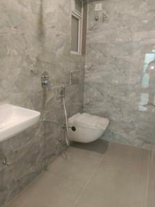 Common Bathroom Image of 548 Sq.ft 1 BHK Apartment / Flat for sale in Shraddha Gold Crest, Kandivali West Mumbai for Rs. 12500000