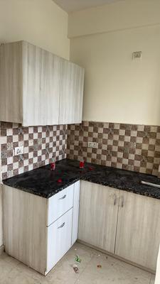 Kitchen Image of 1024 Sq.ft 2 BHK Apartment / Flat for rent in Mahagun Mantra, Noida Extension Greater Noida for Rs. 17000
