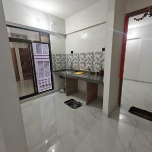 Kitchen Image of 725 Sq.ft 1 BHK Apartment / Flat for rent in Satyam Precious, Kamothe Navi Mumbai for Rs. 20000