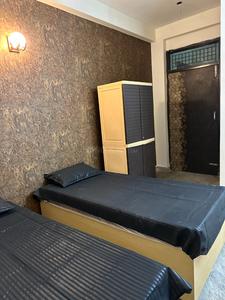 Bedroom Image of Golihaar PG in Sector 72, Noida