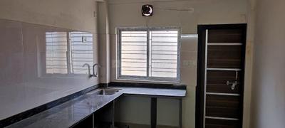 Kitchen Image of 930 Sq.ft 2 BHK Apartment / Flat for sale in Birati Kolkata for Rs. 3600000