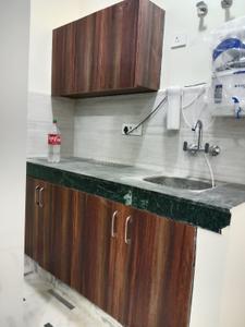 Kitchen Image of 1500 Sq.ft 1 BHK Builder Floor for rent in Sector 17 Gurgaon for Rs. 30000