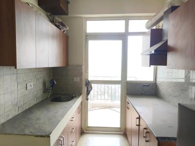 Kitchen Image of 1045 Sq.ft 2 BHK Apartment / Flat for rent in Suncity Avenue 76, Sector 76 Gurgaon for Rs. 32500