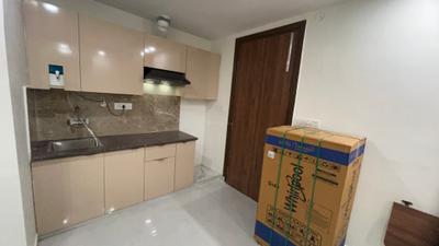 Kitchen Image of 950 Sq.ft 1 BHK Builder Floor for rent in CGHS Urban Green, Sector 39 Gurgaon for Rs. 32000