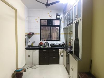 Kitchen Image of 1050 Sq.ft 2 BHK Apartment / Flat for sale in Thakurli Thane for Rs. 7800000