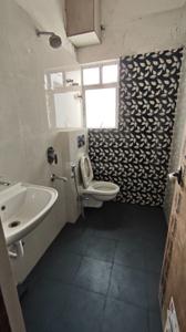 Bathroom Image of 1075 Sq.ft 2 BHK Apartment / Flat for sale in Ambient Winds, Kalikapur, EM Bypass Kolkata for Rs. 9500000