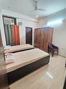Bedroom Image of Urbanroomz Boys Pg in Sector 54, Gurgaon