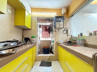 Kitchen Image of 700 Sq.ft 1.5 BHK Apartment / Flat for rent in Dosti West County Oak, Thane West Thane for Rs. 34000