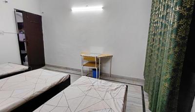 Bedroom Image of Friend pg in Sector 10, Noida