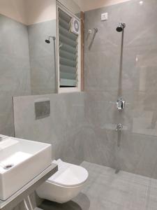 Common Bathroom Image of 977 Sq.ft 2 BHK Apartment / Flat for sale in Arihant Avanti Phase II, Shilgaon Thane for Rs. 6800000