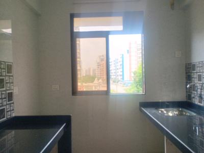 Kitchen Image of 693 Sq.ft 1 BHK Apartment / Flat for sale in Paradise Sai World Dreams, Dombivli East Thane for Rs. 5000000
