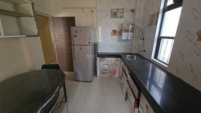 Kitchen Image of 1000 Sq.ft 2 BHK Apartment / Flat for rent in Darode Shreeniwas Bhushan, Karve Nagar Pune for Rs. 32000