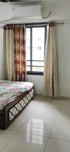 Bedroom Image of 1069 Sq.ft 2 BHK Apartment / Flat for rent in Orchid Blues, Shela Ahmedabad for Rs. 35000