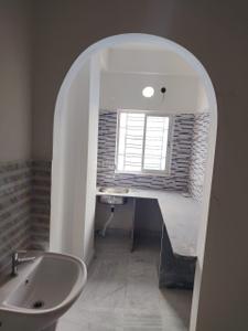 Kitchen Image of 1001 Sq.ft 2 BHK Apartment / Flat for sale in Baguiati Kolkata for Rs. 4504500