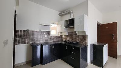 Kitchen Image of 974 Sq.ft 2 BHK Apartment / Flat for sale in SJR Parkway Homes, Rayasandra Bengaluru for Rs. 9700000