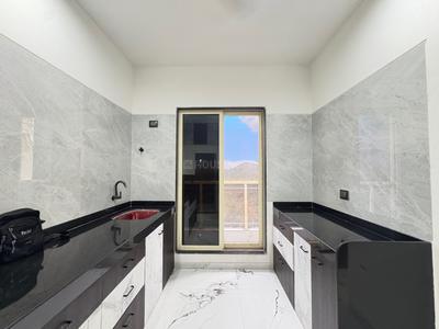 Kitchen Image of 695 Sq.ft 1 BHK Apartment / Flat for sale in Dombivli East Thane for Rs. 4309000