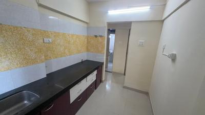Kitchen Image of 550 Sq.ft 1 BHK Apartment / Flat for rent in Aakar Residency, Hiranandani Estate Thane for Rs. 23000