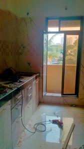 Kitchen Image of 690 Sq.ft 1 BHK Apartment / Flat for sale in Sai Gangat Apartment, Kasarvadavali Thane for Rs. 4300000