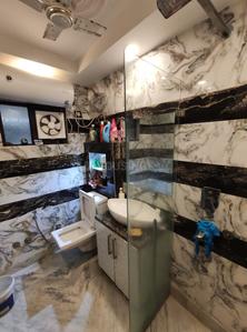 Bathroom Image of 910 Sq.ft 3 BHK Apartment / Flat for sale in Janakpuri New Delhi for Rs. 13000000