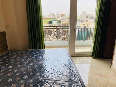 Bedroom Image of Urbanroomz PG GolfCourse Road in Sushant Lok Phase 1, Gurgaon