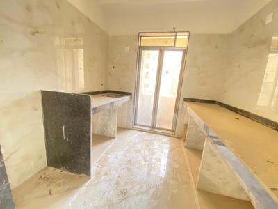 Kitchen Image of 776 Sq.ft 1 BHK Apartment / Flat for sale in Paradigm Pushpanjali Residency Phase III, Thane West Thane for Rs. 6400000