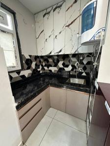 Kitchen Image of 500 Sq.ft 1 RK Builder Floor for rent in Sector 15 Gurgaon for Rs. 23000