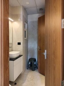 Common Bathroom Image of 1719 Sq.ft 3 BHK Apartment / Flat for sale in Calista Heights, Noida Extension Greater Noida for Rs. 10317000