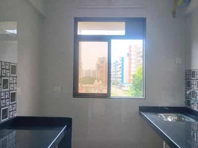 Kitchen Image of 730 Sq.ft 1 BHK Apartment / Flat for rent in Nisarg Greens Phase II A, Ambernath East Ambernath for Rs. 14000