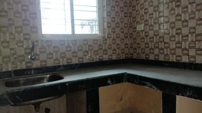Kitchen Image of 950 Sq.ft 2 BHK Apartment / Flat for sale in Rupayan Construction Su Casa Wood, Narendrapur Kolkata for Rs. 3300000