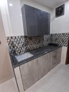 Kitchen Image of 350 Sq.ft 1 RK Studio for rent in Old Double Storey, Lajpat Nagar New Delhi for Rs. 20000