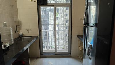 Kitchen Image of 680 Sq.ft 1 BHK Apartment / Flat for sale in Gajra Bhoomi Gardenia 1, Kalamboli Navi Mumbai for Rs. 5400000