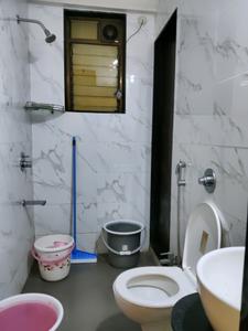 Common Bathroom Image of 648 Sq.ft 2 BHK Apartment / Flat for sale in Rajaram Sukur Enclave, Kasarvadavali Thane for Rs. 9500000